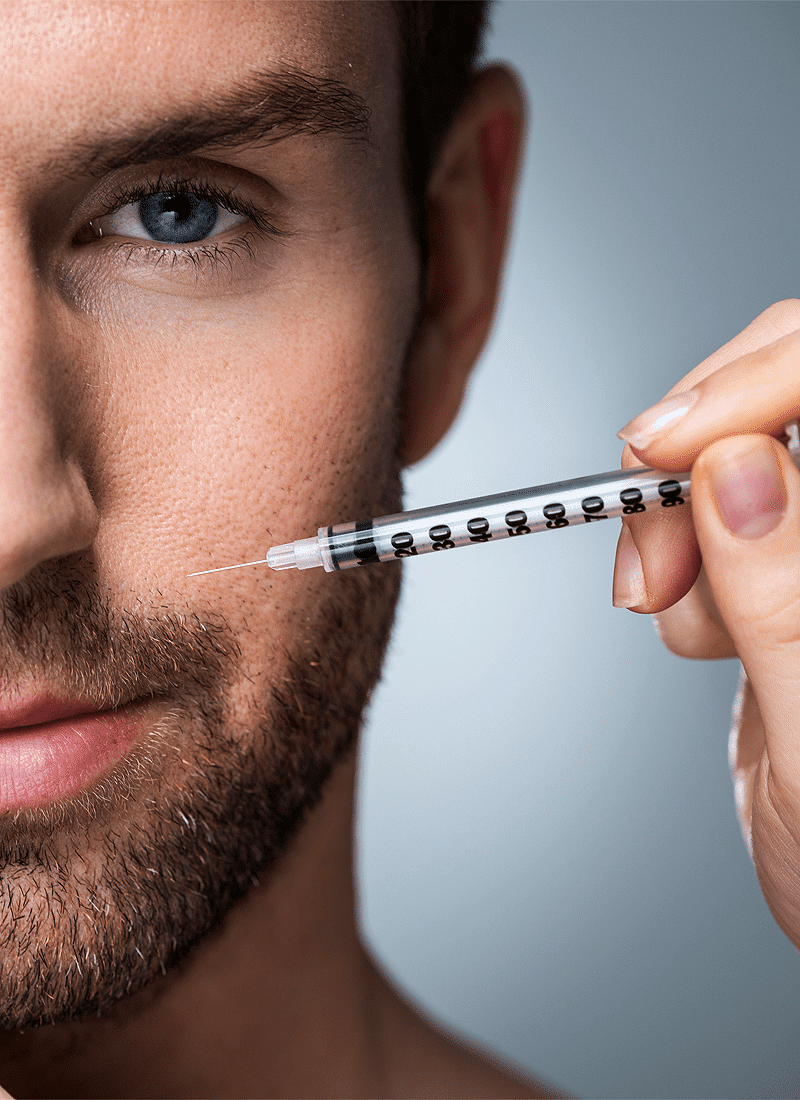Man receiving a facial Botox injection