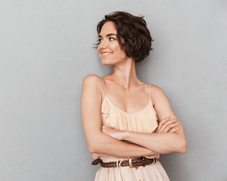 woman with toned upper arms after arm lift surgery